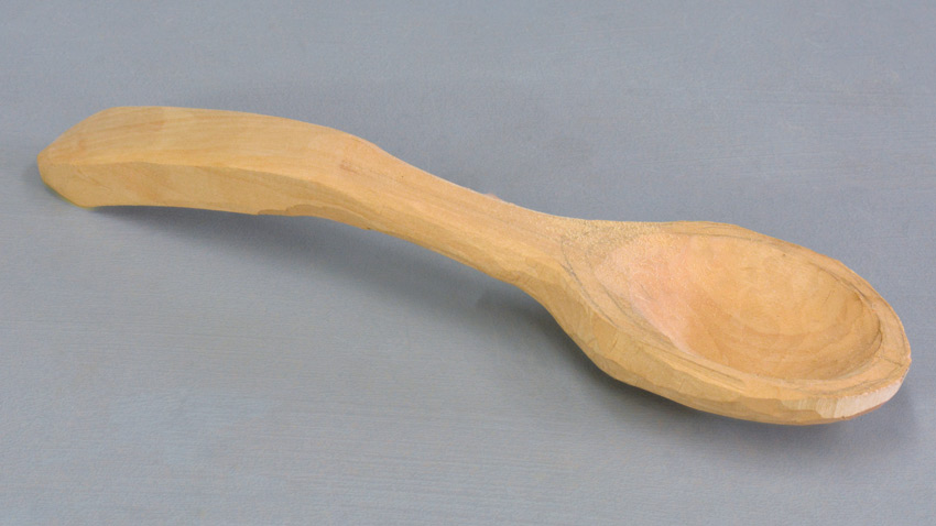 Carved wood spoon