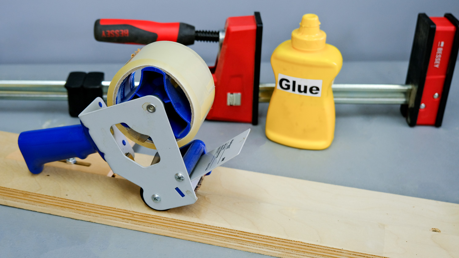Packing tape to stop glue dripping.