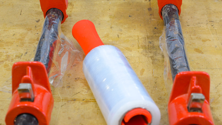 Plastic wrap bar clamps