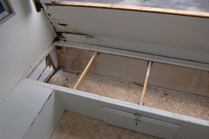 Inside water damaged travel trailer